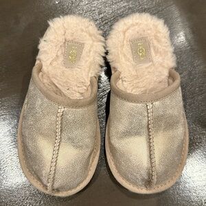 Toddler UGG slip on slipper with hard sole.